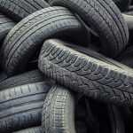 Used,Car,Tires,Pile,In,The,Tire,Repair,Shop,Yard